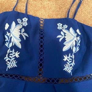 Dark Blue Floral Romper With Tie In The Back